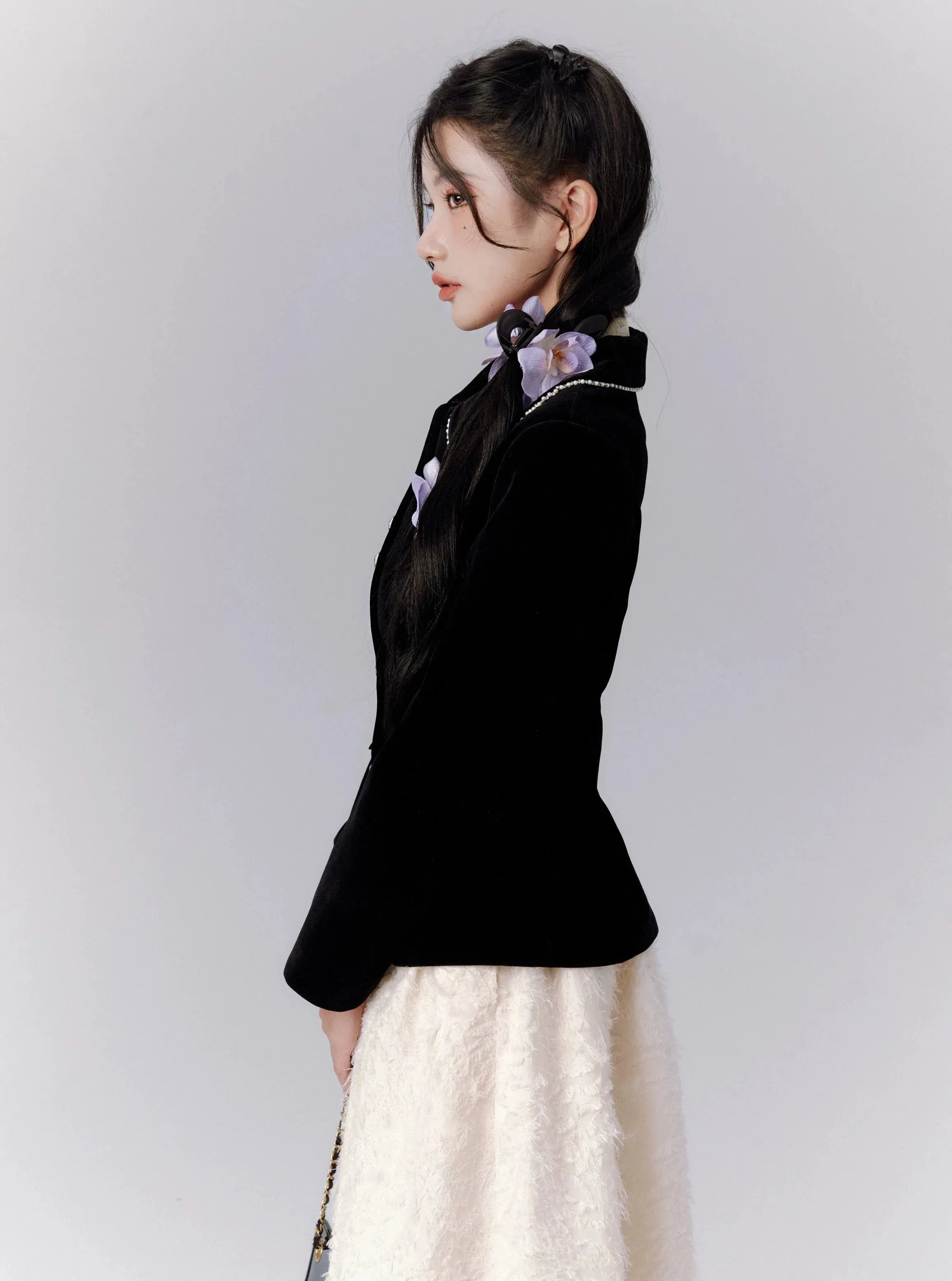 Elegant Black Fitted Blazer with Floral Brooch